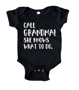 Call Grandma! She Knows What To Do. Baby Boy Girl Onesie White